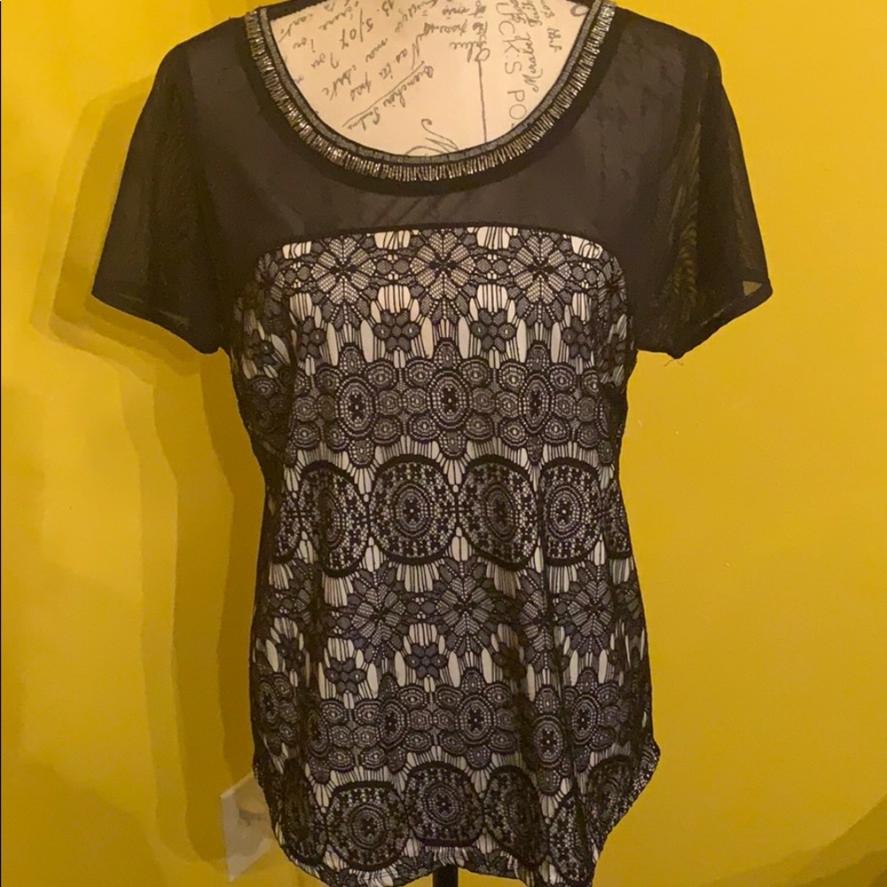 Beautiful beaded sheer blouse.